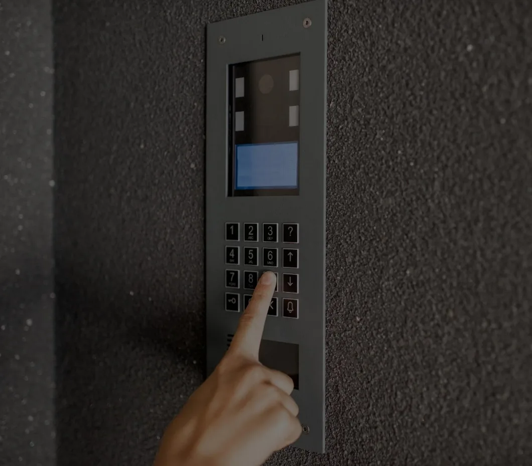 Video intercom panel installation at commercial building entrance by Triton Locksmith