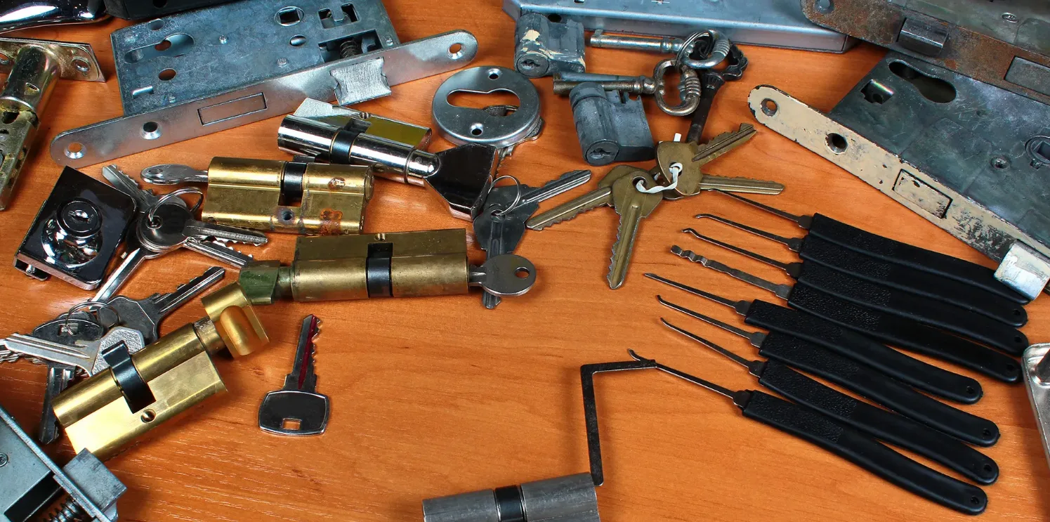 Locksmith rekeying residential pin tumbler lock cylinder with new pins in Boca Raton FL