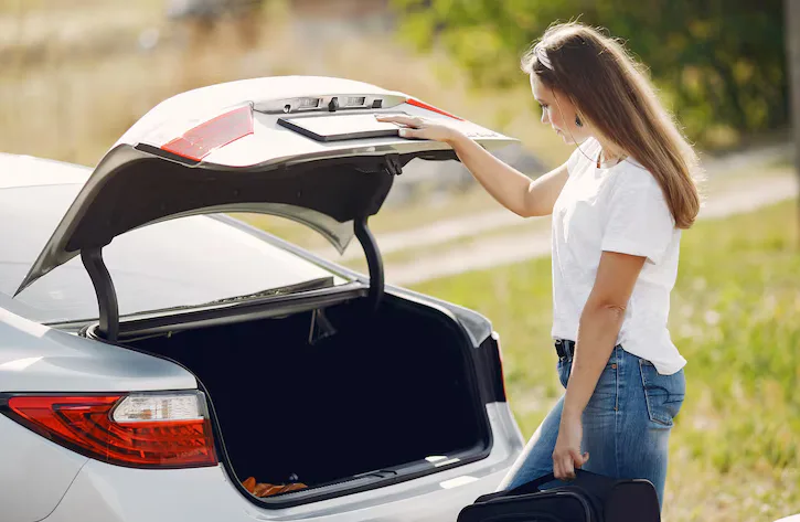 Keys locked in car trunk at parking lot solved by Triton Locksmith mobile service