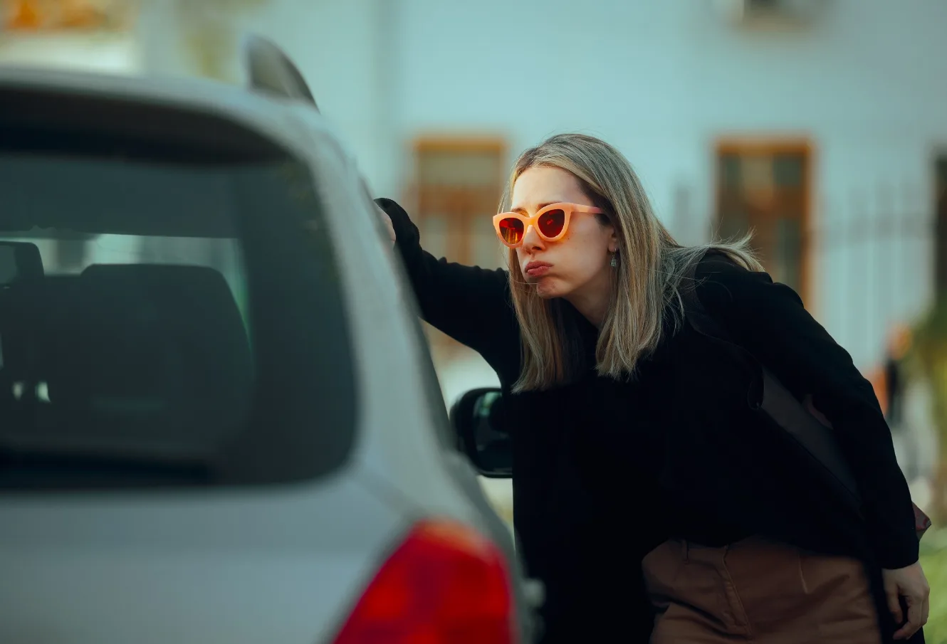 Car lockout service by Triton Locksmith using air wedge and long reach tool without damage