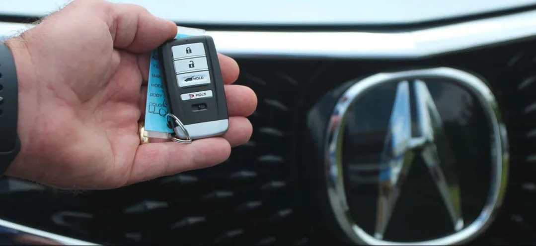New replacement key fob programmed to vehicle on-site by mobile locksmith in South Florida