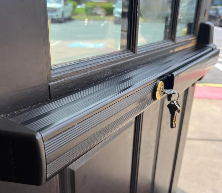 Triton Locksmith repairing Von Duprin panic bar exit device on commercial fire door