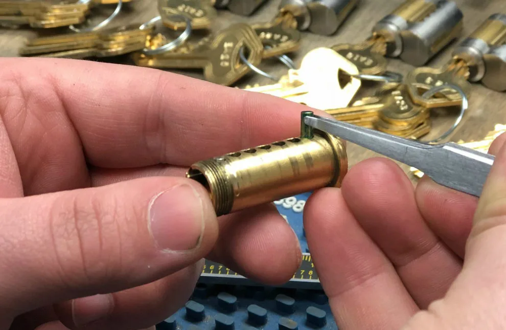 Comparing rekeying versus replacing residential door locks