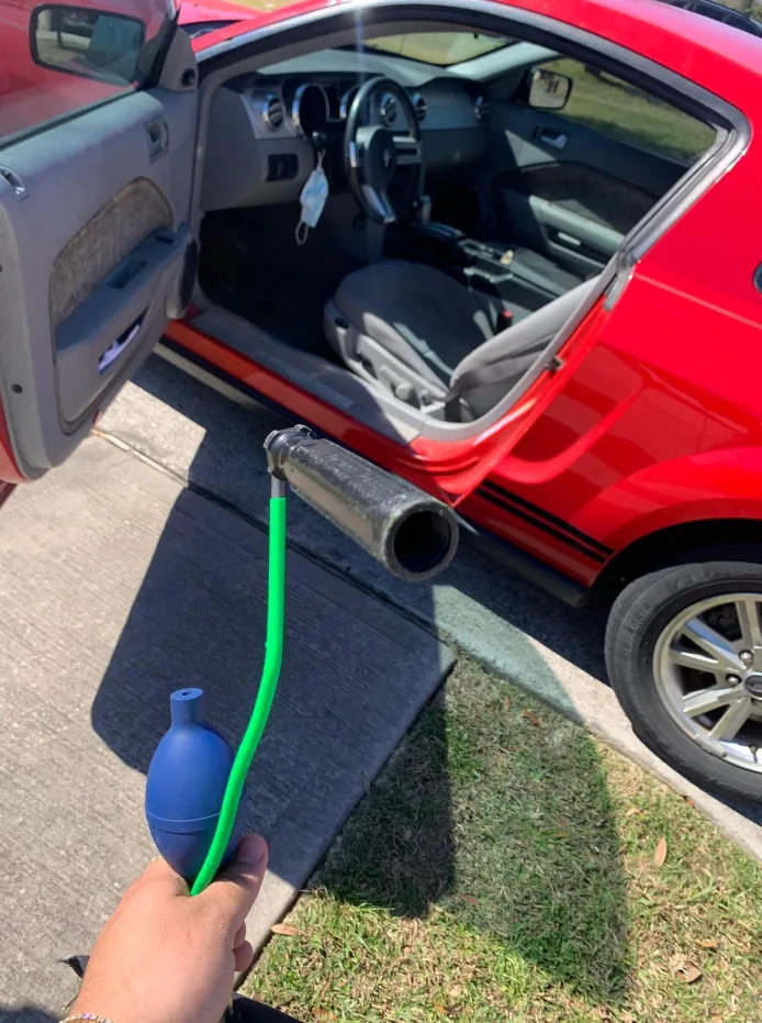 Triton Locksmith using professional tools to safely unlock car without damage